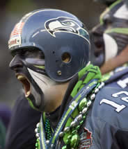Amusing_Wacky_Dressed_Up_Seattle_Seahawks_Football_Team_Fan-1-180x215