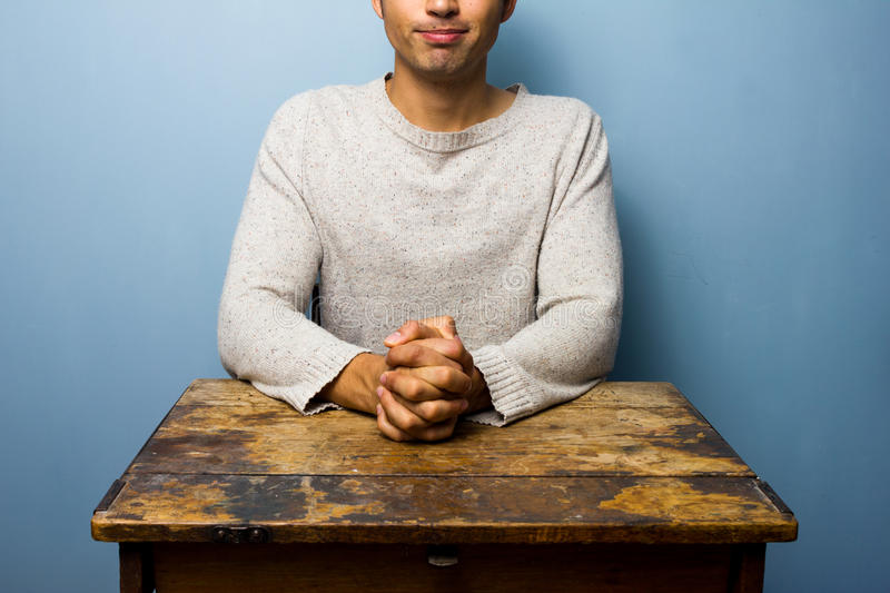 Man-waiting-desk-hands-folded-his-32977976-150712008