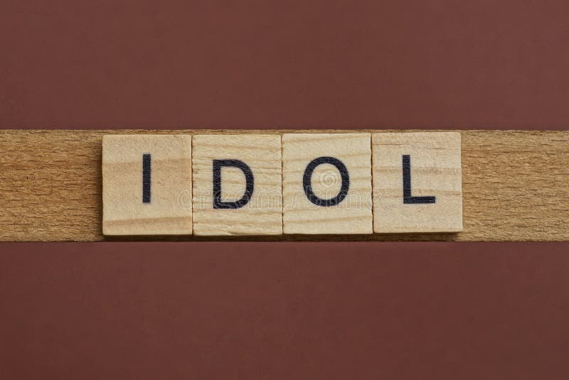Word-idol-wooden-letters-word-idol-wooden-letters-lies-brown-backgound-254711158-3082501178